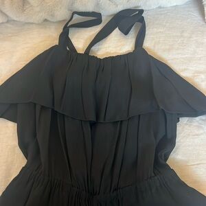 Black romper with ruffle top